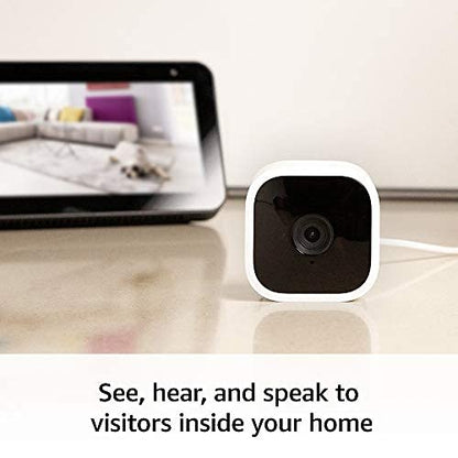 Blink Mini - Compact indoor plug-in smart security camera, 1080p HD video, night vision, motion detection, two-way audio, easy set up, Works with Alexa – 1 camera (White)